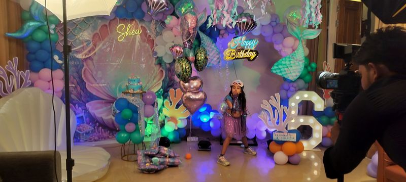 Mermaid theme birthday decoration by PartyCraz with customised backdrop, balloon décor, LED number 6 and lighting, Delhi NCR